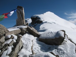 Stanzin's prayer flags with the highest point we reached on the trip in the backdrop (Photo: Shyam G Menon).