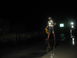 Night of August 11; Grant Maughan crossing the waterlogged stretch of road (Photo: Shyam G Menon)