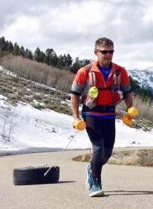 Training, pulling a tyre (Photo: courtesy Grant Maughan)