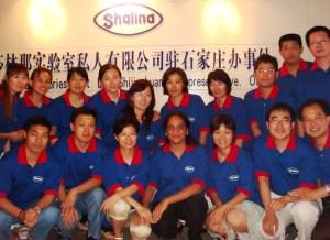 Meena with her team at the China office of Shalina Healthcare 